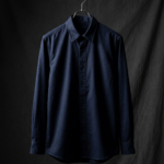 Blank navy workshirt on a steel hanger